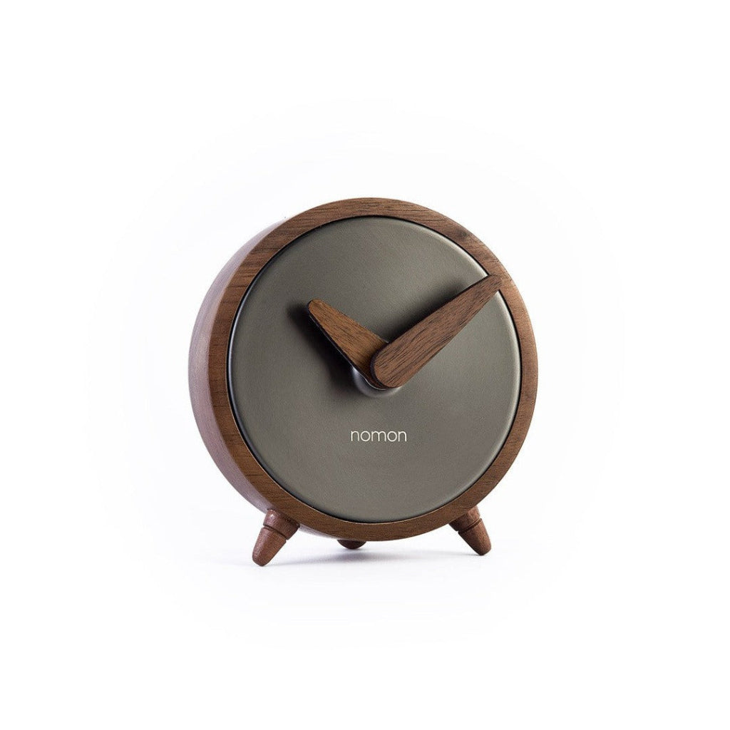 A minimalist Nomon Atomo Table T AMTN wooden clock on a white background. available at Spacio retail stores in Mumbaii & Kolkata and online.