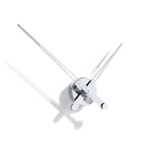 A Nomon wall clock with an avant-garde design featuring two swords: the Clock Nomon Axioma i 60 AXI. available at Spacio retail stores in Mumbaii & Kolkata and online.