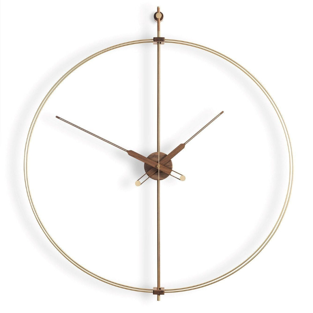 Modern wall clock with gold frame and wooden hands on a white background available at Spacio retail stores in Mumbaii & Kolkata and online.