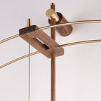 Chandelier with wooden and gold fixtures on a white background