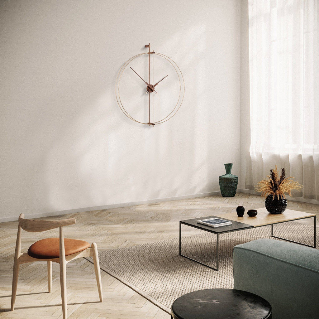 Modern living room with a wall clock, coffee table, and chair.