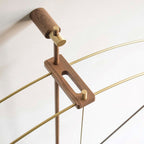 Wooden and brass lamp stand on a white background