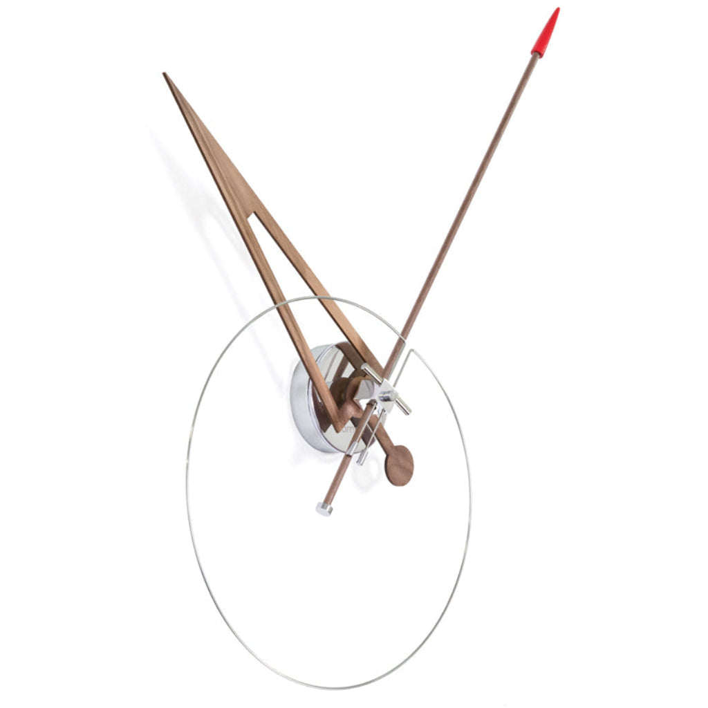 A minimalist Nomon wall clock with a modernist arrow in the middle. available at Spacio retail stores in Mumbaii & Kolkata and online.