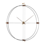A Nomon Delmori G/F Black/A Walnut DEG000NN wall clock made of metal and wood. available at Spacio retail stores in Mumbaii & Kolkata and online.