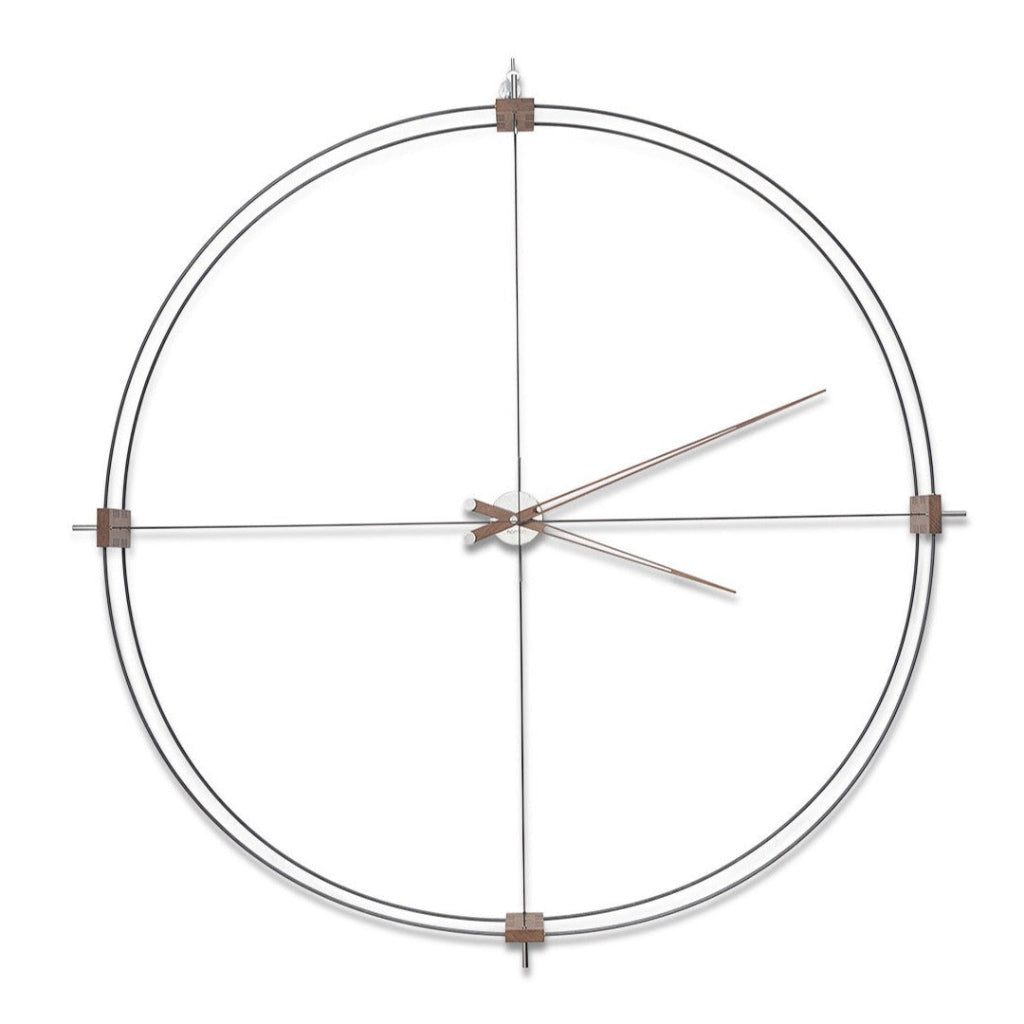 A Nomon wall clock with a circular shape on a white background, perfect for interior decoration. available at Spacio retail stores in Mumbaii & Kolkata and online.