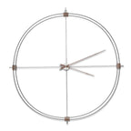 A Nomon wall clock with a circular shape on a white background, perfect for interior decoration. available at Spacio retail stores in Mumbaii & Kolkata and online.