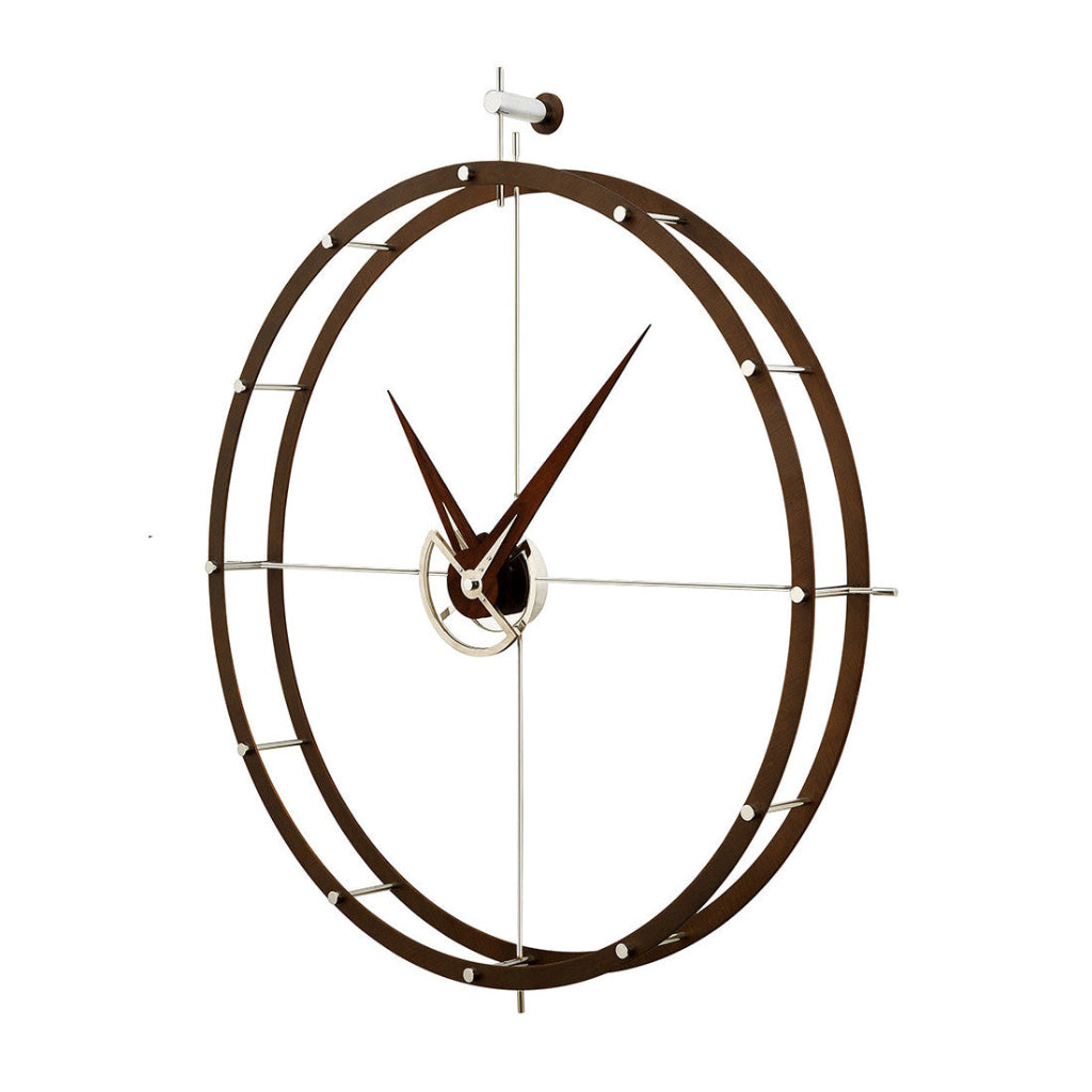 Decorative wall clock with brown metal design on a white background