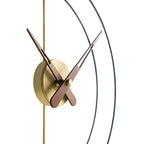 Modern wall clock with gold and wooden design on a white background