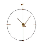 Decorative wall clock with gold hands and frame on a white background