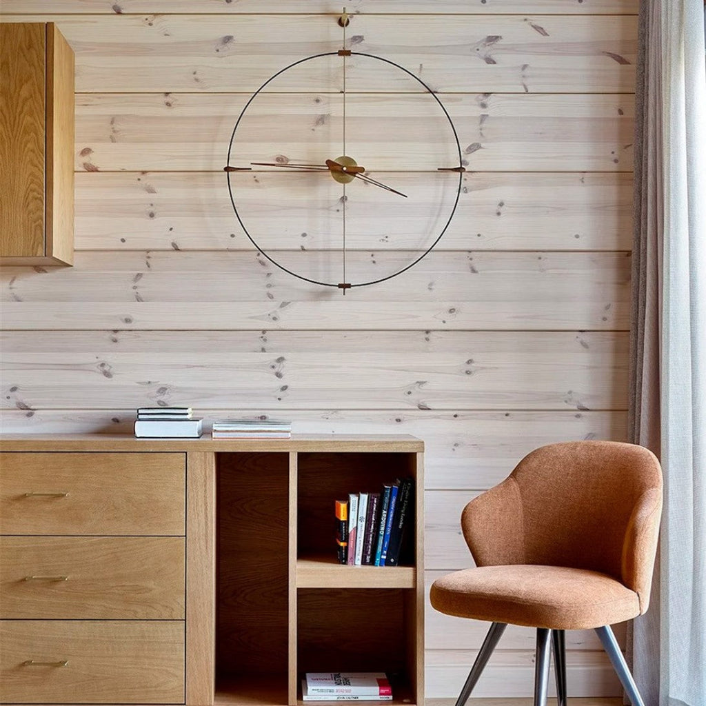 Wooden cabinet with books and a chair against a wooden wall with a round clock.