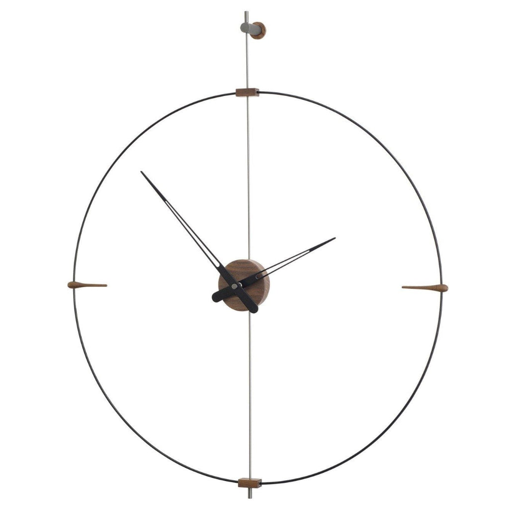 Decorative wall clock with a minimalist design on a white background