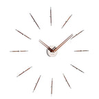 A Nomon minimalist wall clock with a circular pattern on a white background. available at Spacio retail stores in Mumbaii & Kolkata and online.