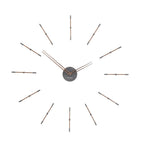 An elegant Nomon clock with metal rods on a white background. available at Spacio retail stores in Mumbaii & Kolkata and online.