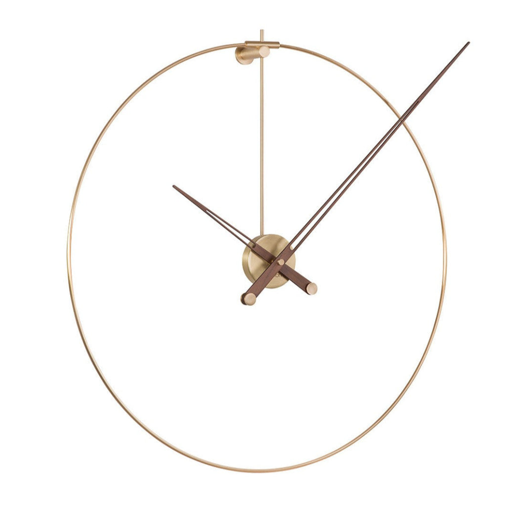 A Clock Nomon New Anda Gold NADN with a brass structure. available at Spacio retail stores in Mumbaii & Kolkata and online.