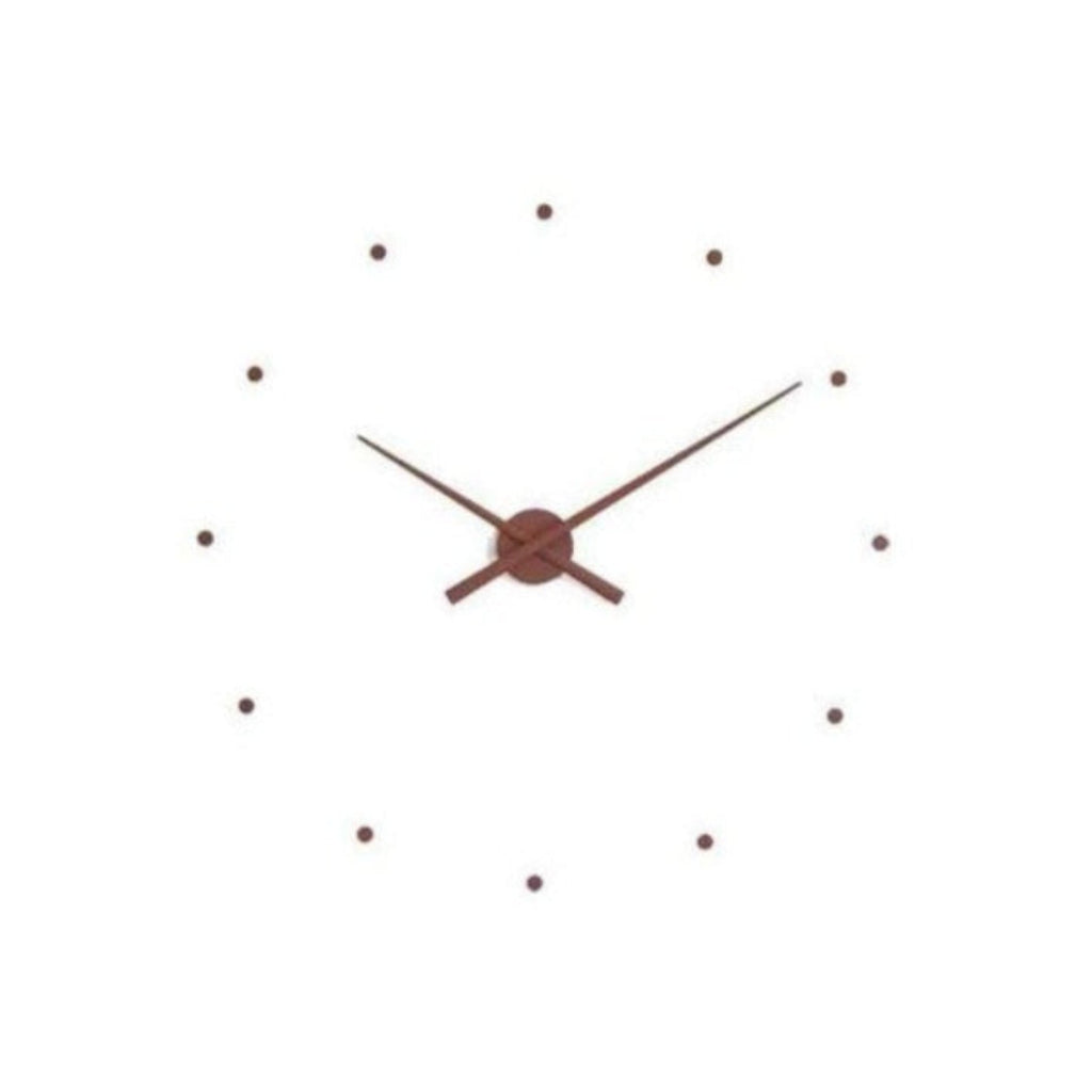 A Clock Nomon OJ Mini Brown 50cm wall clock with a design of a brown clock on a white background. available at Spacio retail stores in Mumbaii & Kolkata and online.