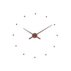 A Clock Nomon OJ Mini Brown 50cm wall clock with a design of a brown clock on a white background. available at Spacio retail stores in Mumbaii & Kolkata and online.