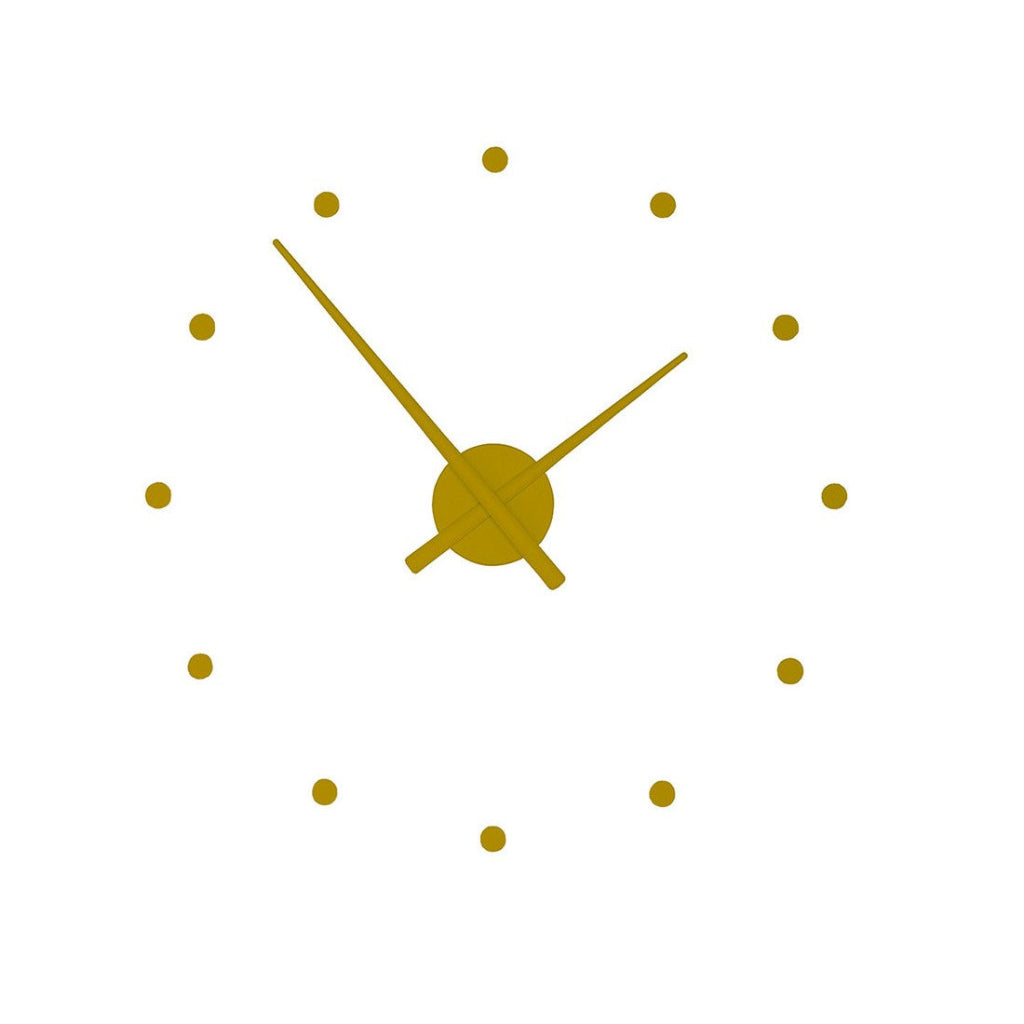 Gold clock face with large hands on a white background available at Spacio retail stores in Mumbaii & Kolkata and online.