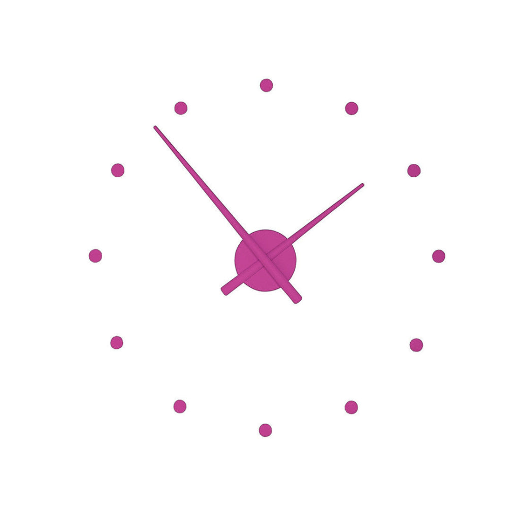 Pink wall clock with minimal design on a white background available at Spacio retail stores in Mumbaii & Kolkata and online.