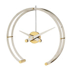 A sleek gold and brass Clock Nomon Omega G OMG with a professional style, featuring a circular shape. available at Spacio retail stores in Mumbaii & Kolkata and online.