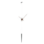 A stylish Nomon clock on a pole with a unique Clock Nomon Pendulo T - Walnut PET0000N clock face design. available at Spacio retail stores in Mumbaii & Kolkata and online.