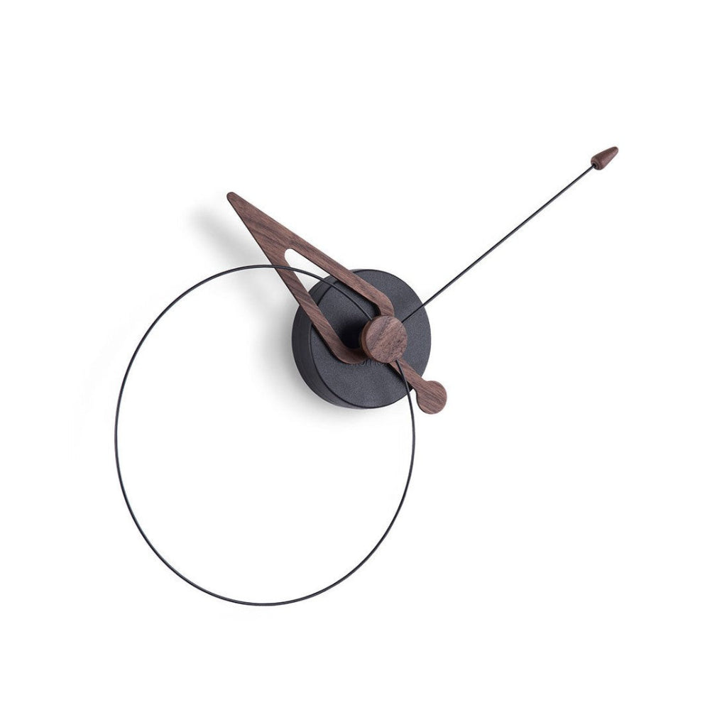 Modern wall clock with wooden hour and minute hands on a white background available at Spacio retail stores in Mumbaii & Kolkata and online.