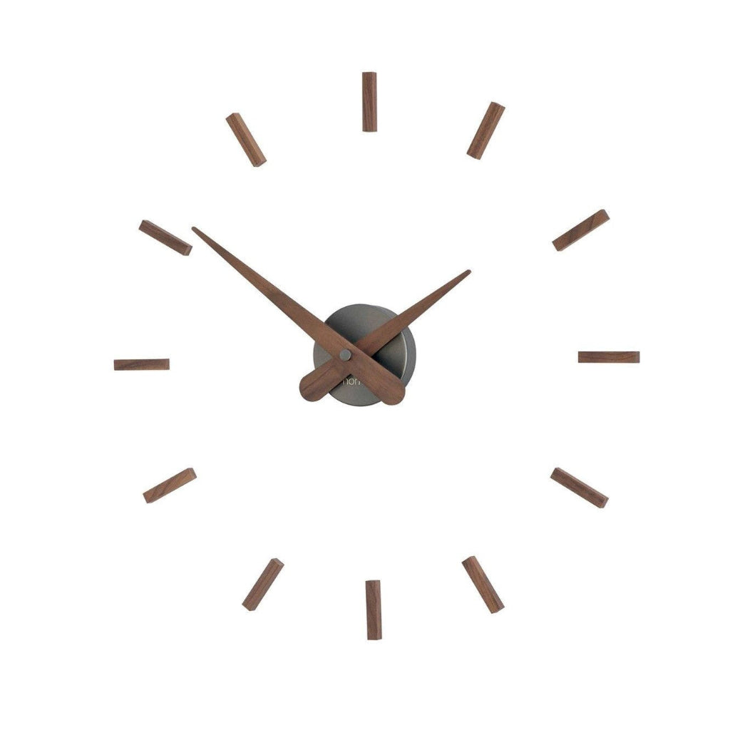Wall clock with brown hour and minute hands on a white background available at Spacio retail stores in Mumbaii & Kolkata and online.