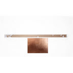 Metallic color swatch with a scale on a white background from Progetti available at Spacio retail stores in Mumbaii & Kolkata and online.