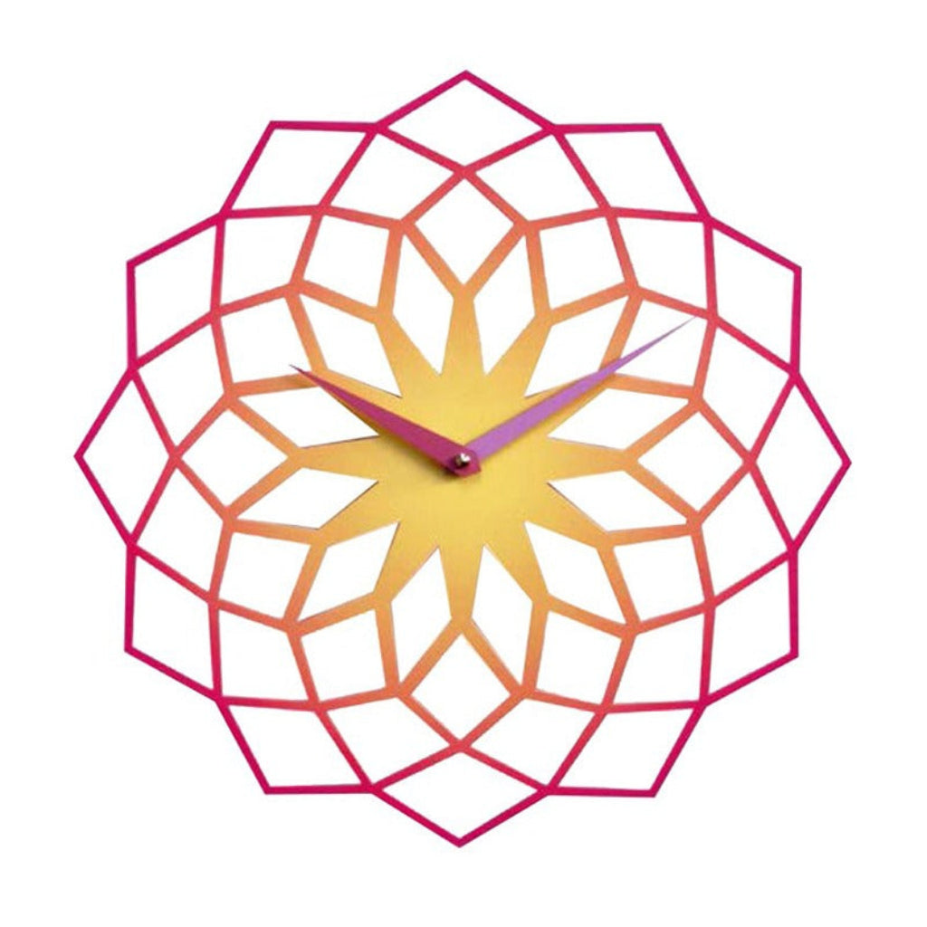 Geometric wall clock with pink and yellow gradient on a white background from Progetti available at Spacio retail stores in Mumbaii & Kolkata and online.