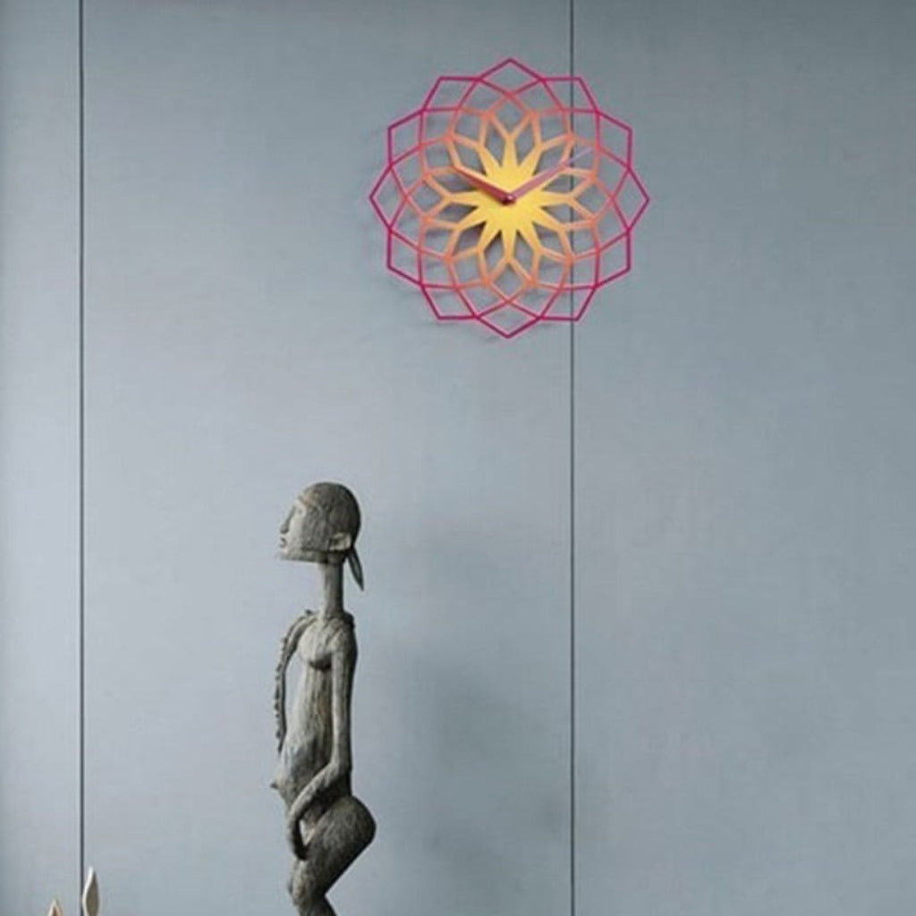 Statue of a person with a colorful geometric design above on a gray background