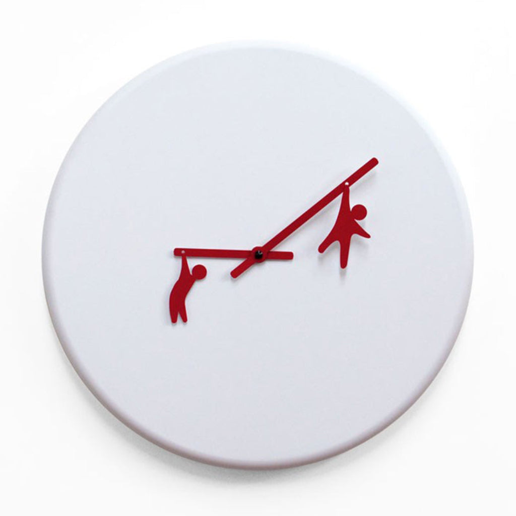 White wall clock with red silhouette figures on a white background available at Spacio retail stores in Mumbaii & Kolkata and online.