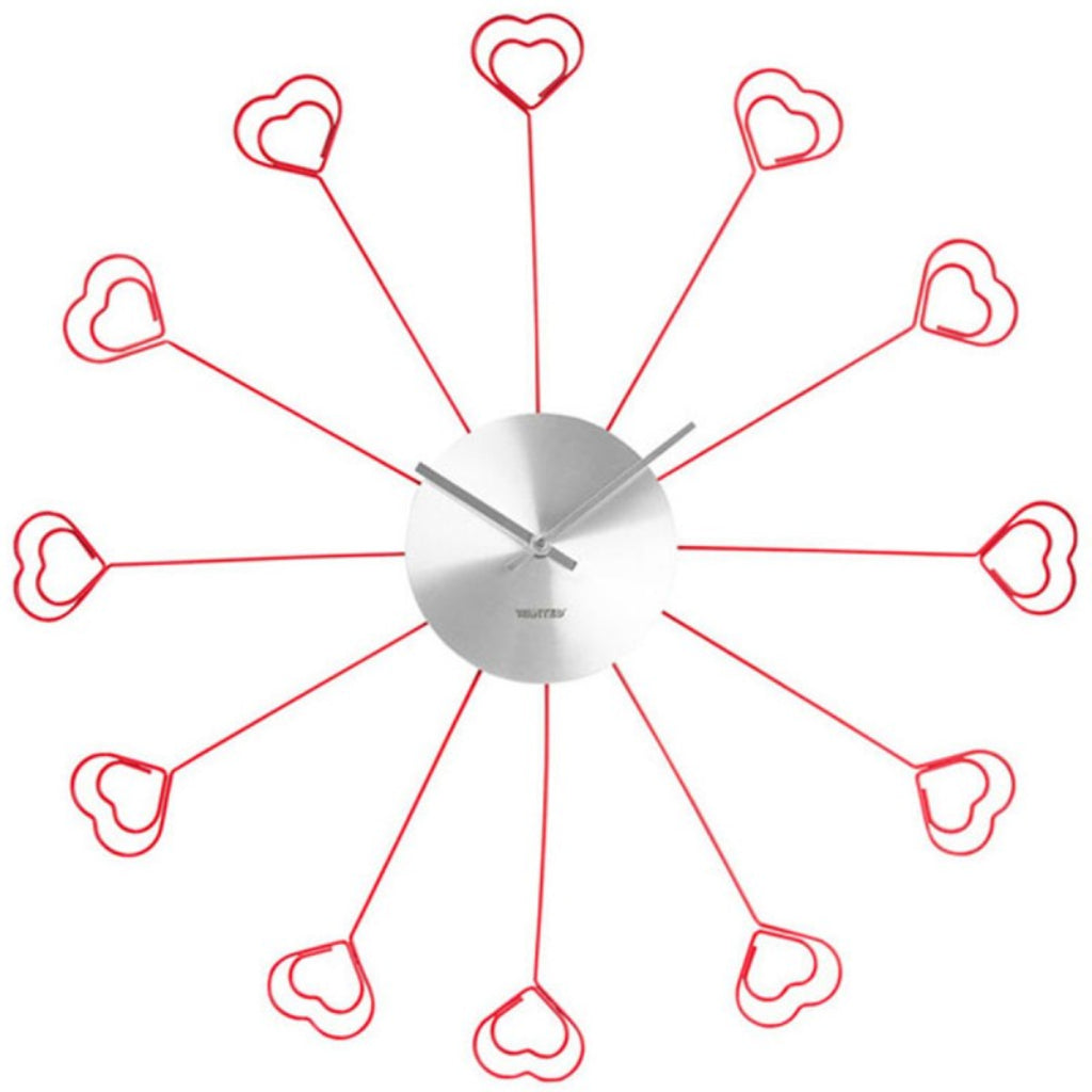 Decorative wall clock with heart designs on a white background available at Spacio retail stores in Mumbaii & Kolkata and online.