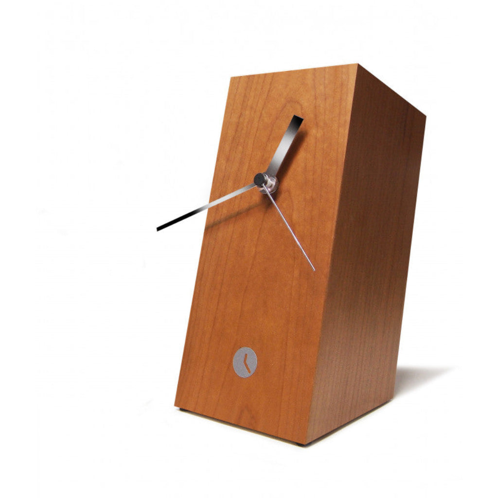 Wooden clock with a white background from Tothora available at Spacio retail stores in Mumbaii & Kolkata and online.