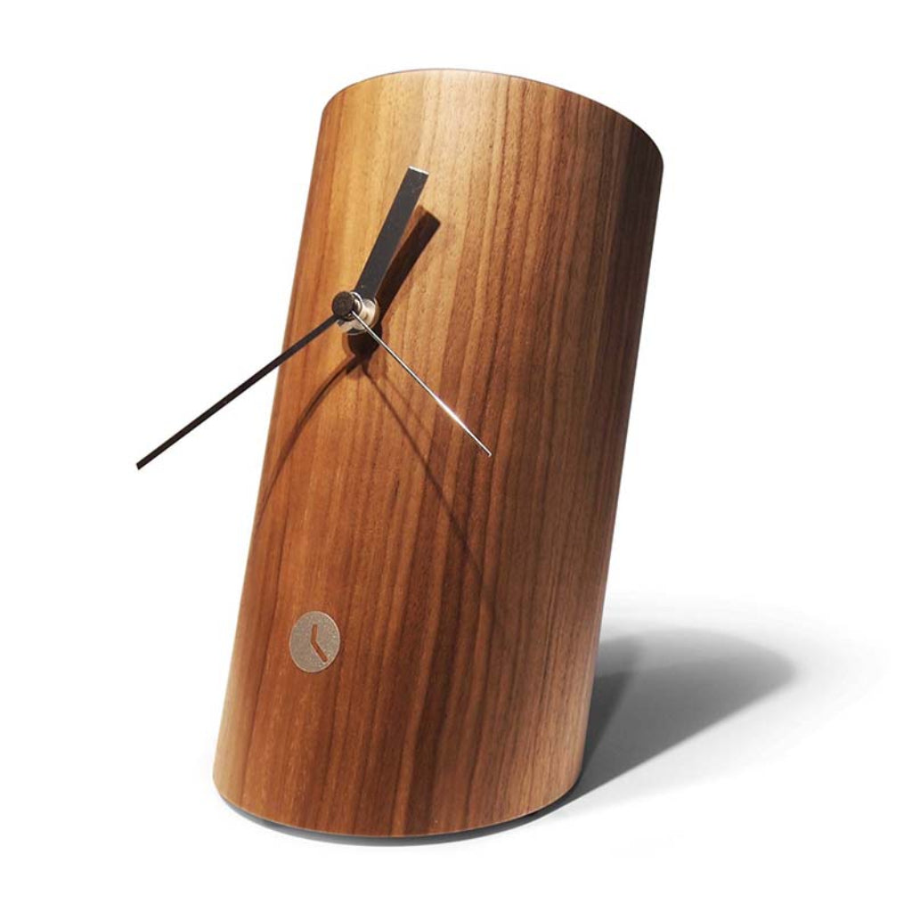 Wooden clock with a minimalist design on a white background from Tothora available at Spacio retail stores in Mumbaii & Kolkata and online.